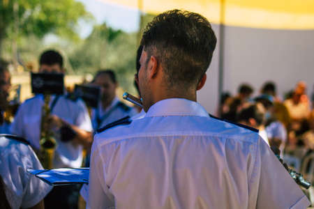 Carmona Spain September 26, 2021 Focus of members of a local music orchestra playing music in the streets of Carmona during the coronavirus epidemic hitting Spainのeditorial素材