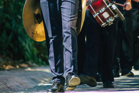 Carmona Spain September 26, 2021 Focus of members of a local music orchestra playing music in the streets of Carmona during the coronavirus epidemic hitting Spainのeditorial素材