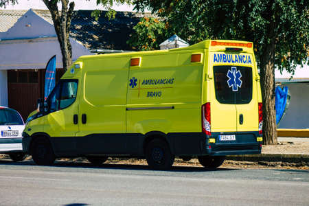 Seville Spain September 28, 2021 Ambulance driving through the streets of Seville during the coronavirus outbreak hitting Spain, wearing a mask is mandatoryのeditorial素材