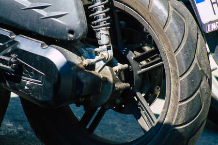 Seville Spain September 28, 2021 Motorcycle parked in the streets of Seville, an emblematic city and the capital of the region of Andalusiaのeditorial素材