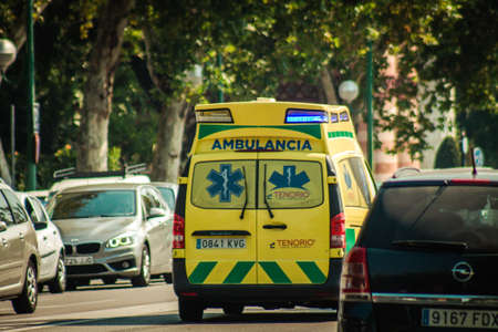Seville Spain September 28, 2021 Ambulance driving through the streets of Seville during the coronavirus outbreak hitting Spain, wearing a mask is mandatoryのeditorial素材