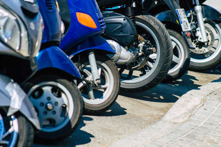 Seville Spain September 28, 2021 Motorcycle parked in the streets of Seville, an emblematic city and the capital of the region of Andalusiaのeditorial素材