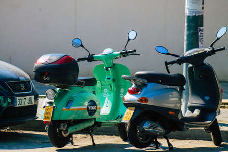 Seville Spain September 28, 2021 Motorcycle parked in the streets of Seville, an emblematic city and the capital of the region of Andalusiaのeditorial素材
