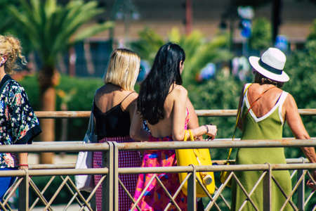 Seville Spain September 18, 2021 Pedestrians walking in the street during the coronavirus outbreak hitting Spain, wearing a mask is not mandatory but most of people wear itのeditorial素材