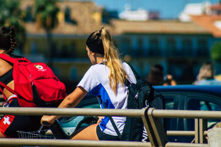 Seville Spain September 18, 2021 People rolling with a bicycle in the streets of Seville, an emblematic city and the capital of the region of Andalusia, in the south of Spainのeditorial素材