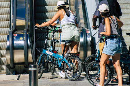 Seville Spain September 18, 2021 People rolling with a bicycle in the streets of Seville, an emblematic city and the capital of the region of Andalusia, in the south of Spainのeditorial素材