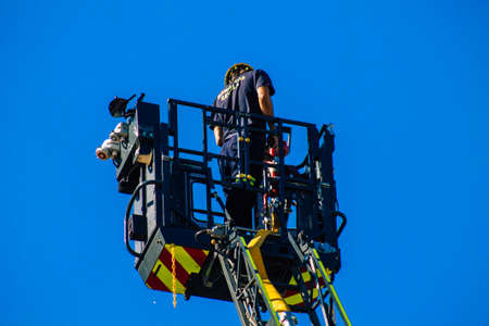Seville Spain September 22, 2021 Seville firefighters training at the fire station during the coronavirus outbreak, they are training in the use of firefighting equipment under intervention conditionsのeditorial素材