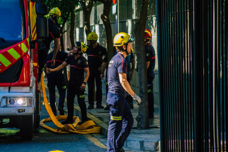 Seville Spain September 22, 2021 Seville firefighters training at the fire station during the coronavirus outbreak, they are training in the use of firefighting equipment under intervention conditionsのeditorial素材