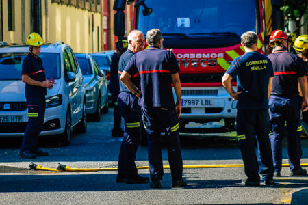 Seville Spain September 22, 2021 Seville firefighters training at the fire station during the coronavirus outbreak, they are training in the use of firefighting equipment under intervention conditionsのeditorial素材