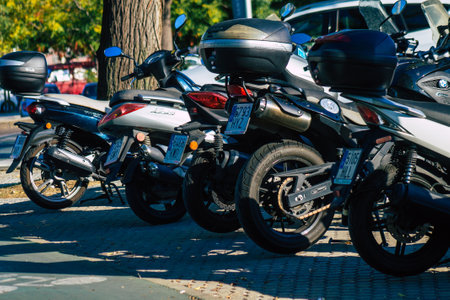 Seville Spain September 22, 2021 Motorcycle parked in the streets of Seville, an emblematic city and the capital of the region of Andalusiaのeditorial素材