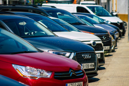 Seville Spain September 28, 2021 Cars parked in the streets of Seville, an emblematic city and the capital of the region of Andalusia, in the south of Spainのeditorial素材