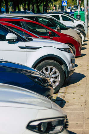 Seville Spain September 28, 2021 Cars parked in the streets of Seville, an emblematic city and the capital of the region of Andalusia, in the south of Spainのeditorial素材
