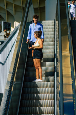 Seville Spain September 18, 2021 Pedestrians using an escalator during the coronavirus outbreak hitting Spain, wearing a mask is not mandatory but most of people wear itのeditorial素材