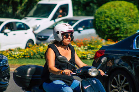 Seville Spain September 22, 2021 People rolling with a motorcycle in the streets of Seville, an...