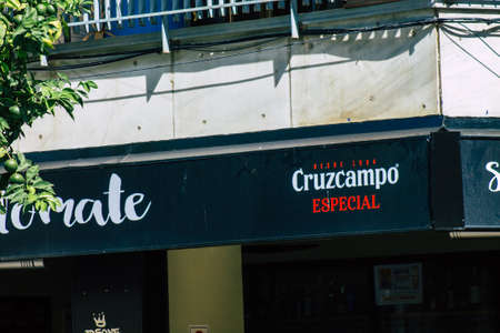 Seville Spain September 18, 2021 Commercial sign front a business located in Seville, an emblematic city and the capital of the region of Andalusia, in the south of Spainのeditorial素材