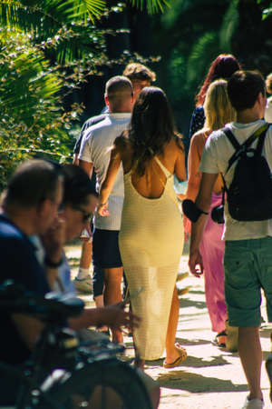 Seville Spain September 22, 2021 Unidentified woman walking in the street during the coronavirus outbreak hitting Spain, wearing a mask is not mandatory but most people wear itのeditorial素材