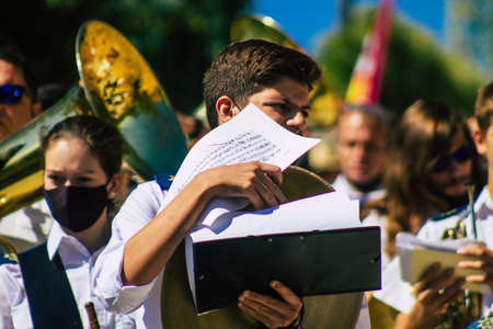 Carmona Spain September 26, 2021 Focus of members of a local music orchestra playing music in the streets of Carmona during the coronavirus epidemic hitting Spainのeditorial素材