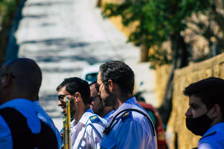 Carmona Spain September 26, 2021 Focus of members of a local music orchestra playing music in the streets of Carmona during the coronavirus epidemic hitting Spainのeditorial素材