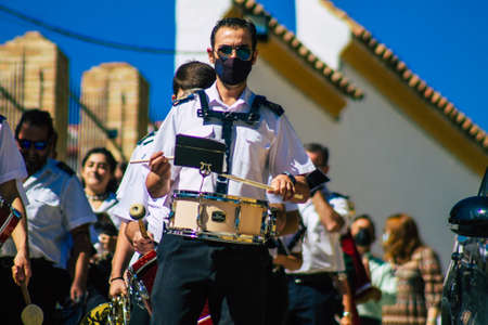 Carmona Spain September 26, 2021 Focus of members of a local music orchestra playing music in the streets of Carmona during the coronavirus epidemic hitting Spainのeditorial素材