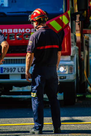 Seville Spain September 22, 2021 Seville firefighters training at the fire station during the coronavirus outbreak, they are training in the use of firefighting equipment under intervention conditionsのeditorial素材