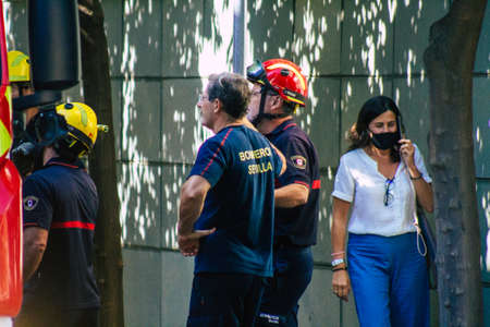 Seville Spain September 22, 2021 Seville firefighters training at the fire station during the coronavirus outbreak, they are training in the use of firefighting equipment under intervention conditionsのeditorial素材