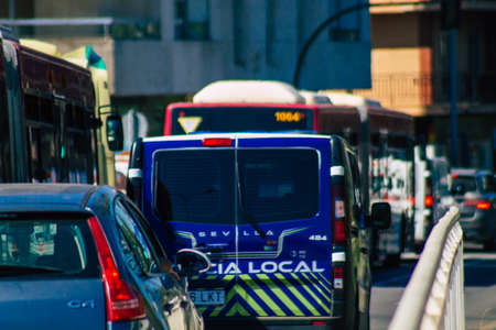Seville Spain September 22, 2021 Police car patrolling in the streets of Seville during the coronavirus outbreak hitting Spain, wearing a mask in the street is not mandatoryのeditorial素材
