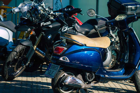 Seville Spain September 22, 2021 Motorcycle parked in the streets of Seville, an emblematic city and the capital of the region of Andalusiaのeditorial素材