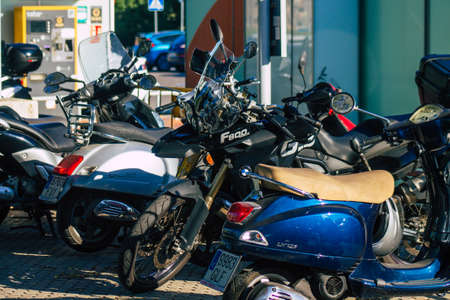 Seville Spain September 22, 2021 Motorcycle parked in the streets of Seville, an emblematic city and the capital of the region of Andalusiaのeditorial素材