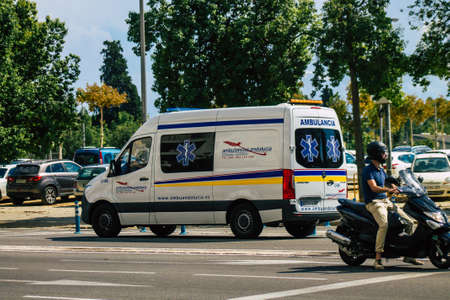 Seville Spain September 22, 2021 Ambulance driving through the streets of Seville during the...