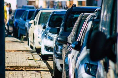 Seville Spain September 22, 2021 Cars parked in the streets of Seville, an emblematic city and the capital of the region of Andalusia, in the south of Spainのeditorial素材