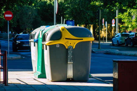Seville Spain September 18, 2021 Garbage container in the streets of Seville, an emblematic city and the capital of the region of Andalusia, in the south of Spainのeditorial素材