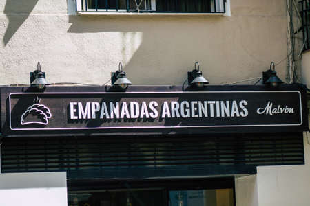 Seville Spain September 18, 2021 Commercial sign front a business located in Seville, an emblematic city and the capital of the region of Andalusia, in the south of Spainのeditorial素材
