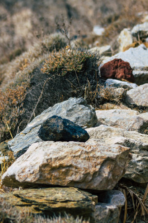 Santorini Island, Perissa, Greece - October 17, 2021 Ancient Thira hiking trail in Santorini,  the ancient path to Perissa leads you through the slopes of Profitis Elias and Mesa Vouno to the topの写真素材