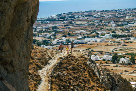 Santorini Island, Perissa, Greece - October 17, 2021 Ancient Thira hiking trail in Santorini,  the ancient path to Perissa leads you through the slopes of Profitis Elias and Mesa Vouno to the topの写真素材