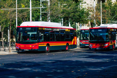 Seville Spain August 28, 2021 Bus driving through the streets of Seville during the coronavirus outbreak hitting Spain, wearing a mask is mandatoryのeditorial素材