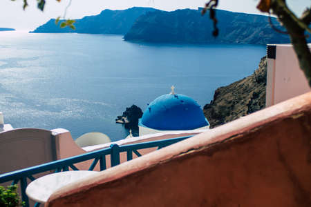 Santorini, Oia, Greece - October 24, 2021 Traditional orthodox church located in the town of Oia front the sea, typical of this island are perched on the side of the ancient active volcanoのeditorial素材