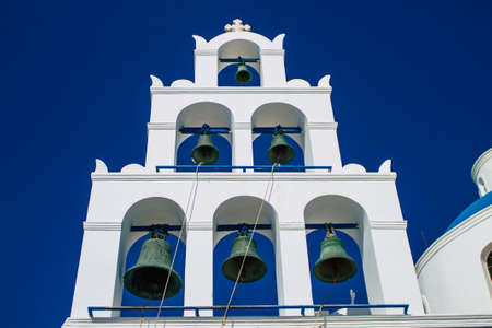 Santorini, Oia, Greece - October 24, 2021 Traditional orthodox church located in the town of Oia front the sea, typical of this island are perched on the side of the ancient active volcanoのeditorial素材