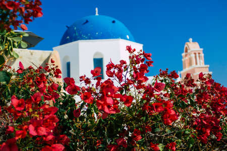 Santorini, Oia, Greece - October 24, 2021 Traditional orthodox church located in the town of Oia front the sea, typical of this island are perched on the side of the ancient active volcanoのeditorial素材