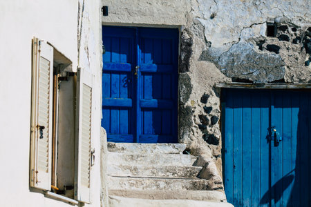 Santorini, Megalochori, Greece - October 24, 2021 Cityscape of Megalochori, the small traditional...
