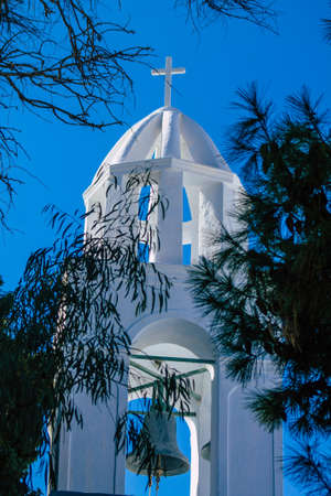 Santorini, Megalochori, Greece - October 24, 2021 Cityscape of Megalochori, the small traditional white houses typical of this island are perched on the side of the ancient active volcanoのeditorial素材