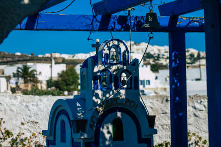 Santorini, Megalochori, Greece - October 24, 2021 Cityscape of Megalochori, the small traditional white houses typical of this island are perched on the side of the ancient active volcanoのeditorial素材