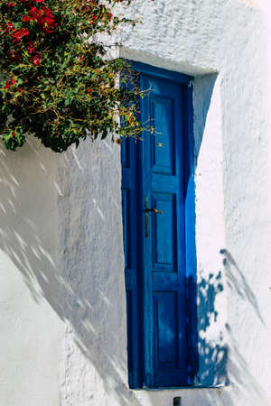 Santorini, Megalochori, Greece - October 24, 2021 Cityscape of Megalochori, the small traditional white houses typical of this island are perched on the side of the ancient active volcanoのeditorial素材