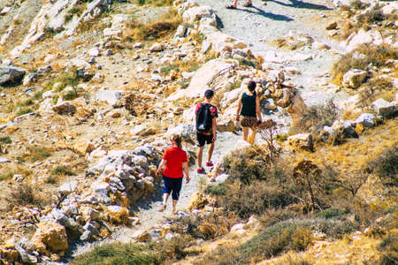 Santorini Island, Perissa, Greece - October 17, 2021 Ancient Thira hiking trail in Santorini,  the ancient path to Perissa leads you through the slopes of Profitis Elias and Mesa Vouno to the topのeditorial素材