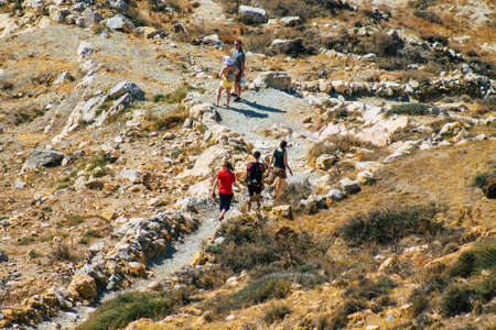 Santorini Island, Perissa, Greece - October 17, 2021 Ancient Thira hiking trail in Santorini,  the ancient path to Perissa leads you through the slopes of Profitis Elias and Mesa Vouno to the topのeditorial素材