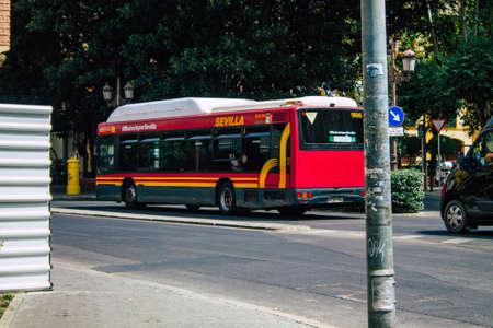 Seville Spain August 11, 2021 Bus driving through the streets of Seville during the coronavirus outbreak hitting Spainのeditorial素材