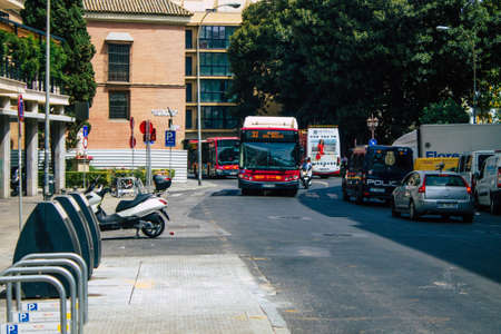 Seville Spain August 11, 2021 Bus driving through the streets of Seville during the coronavirus outbreak hitting Spainのeditorial素材