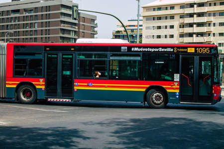 Seville Spain August 11, 2021 Bus driving through the streets of Seville during the coronavirus outbreak hitting Spainのeditorial素材