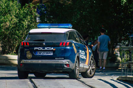 Seville Spain August 11, 2021 Police car patrolling in the streets of Seville during the coronavirus outbreak hitting Spainのeditorial素材