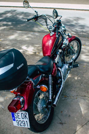 Seville Spain August 11, 2021 Motorcycle parked in the streets of Seville, an emblematic city and...