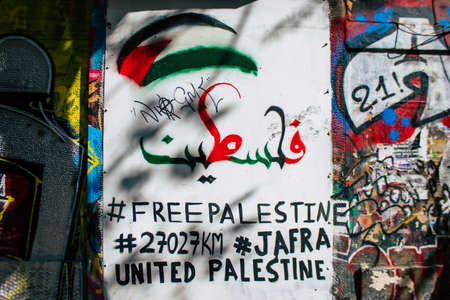 Athens, Greece - November 22, 2021 Street art in Athens, graffiti that covers the whole city, where every alley, shop front, brick wallis an artistic canvas, of political reference or of social satireの写真素材